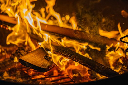 A close up of a fire from a barbecue or fire pit