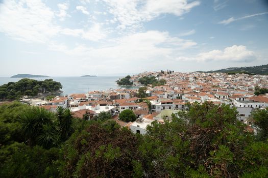 A view overlooking Skiathos Town in Greece during summer