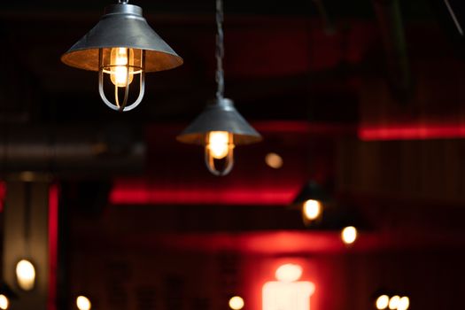 A traditional Edison style pendant light fitting suspended from ceiling