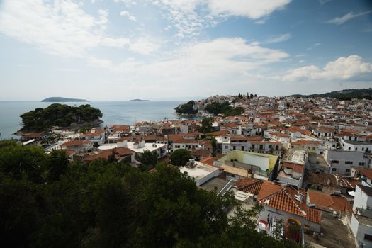 A view overlooking Skiathos Town in Greece during summer