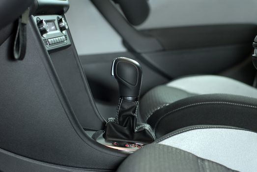 Detail of the interior of the car with the gear shifter