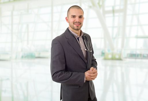 happy male doctor, at the office