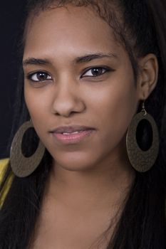 Happy african girl close up portrait, studio picture