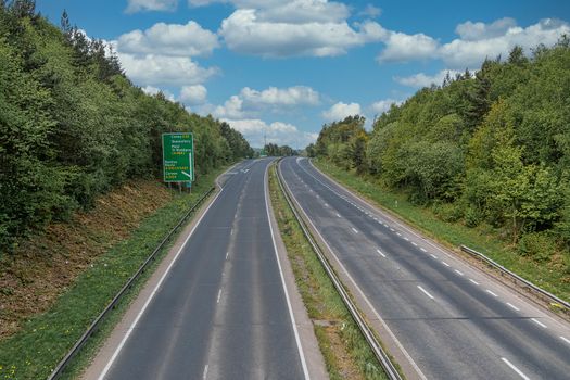 A deserted normally busy main road. The A55 is the main route from England to North Wales, normally full of traffic