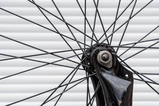 Close view of a bicycle wheel centre showing the spokes connection