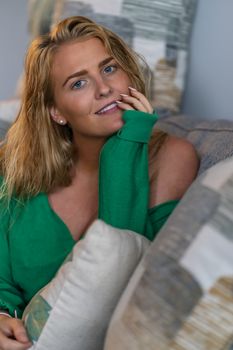 A gorgeous blonde model enjoys a day at home before work