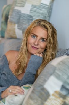 A gorgeous blonde model enjoys a day at home before work