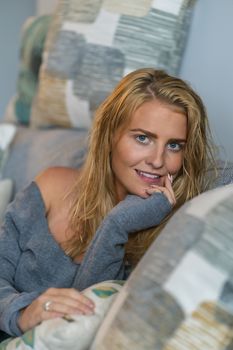 A gorgeous blonde model enjoys a day at home before work