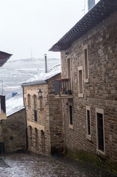 Old houses of Puebla de Sanabria with snow, Castilla y Leon, Spain