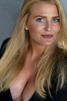 A gorgeous blonde model enjoys a day at home before work