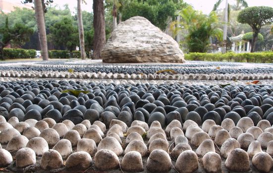 Chinese health walk made up from large pebbles in different colors