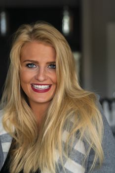 A gorgeous blonde model enjoys a day at home before work