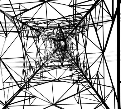 A pylon for electricity transmission is seen from below
