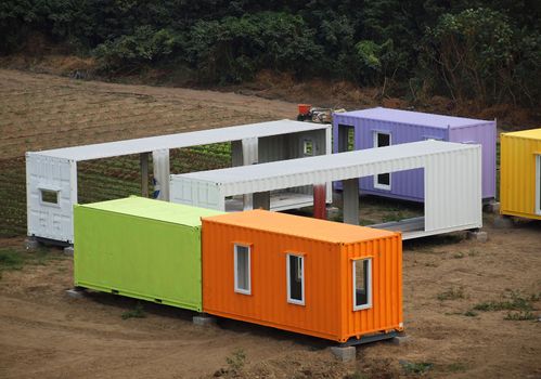 Makeshift metal buildings made from shipping containers
