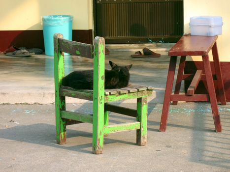 -- relaxing moment on the porch of a Chinese farmhouse
