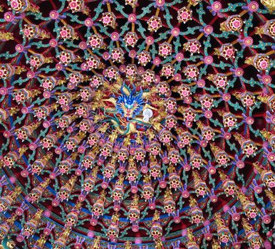 -- Chinese temple detail with a richly carved ceiling
