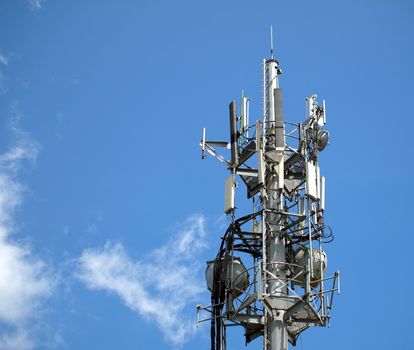 Antennas and modern communications equipments atop a steel mast

