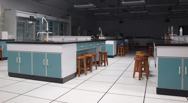 A modern science lab with counters and appliances
