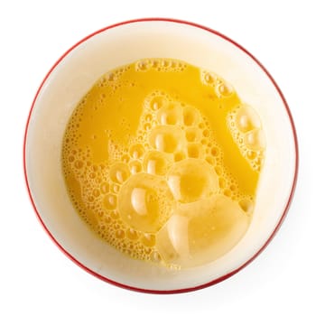 Preparation of eggs for making omelettes isolated on a white background top view