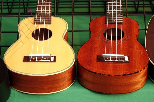 Ukuleles mini guitars on sale at an outdoor stall