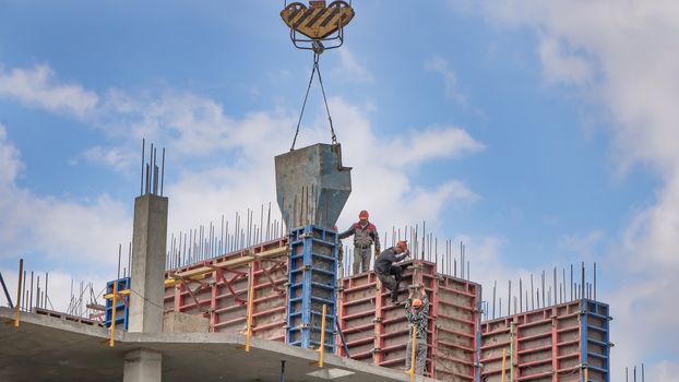 Moscow, Russia-15.05.2020:Construction of a multi-storey residential building. Pre-fabricated structures and products. The construction of a new building or skyscraper.