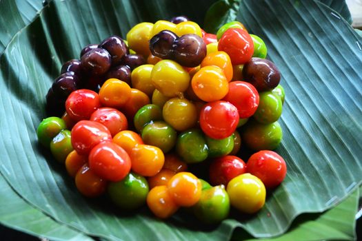 Deletable Imitation Fruits (Kanom Look Choup) - this dessert, many people think of a various kind of colorful fruits. Delerable Imitation Fruits is one of the popular auspicious Thai desserts.

