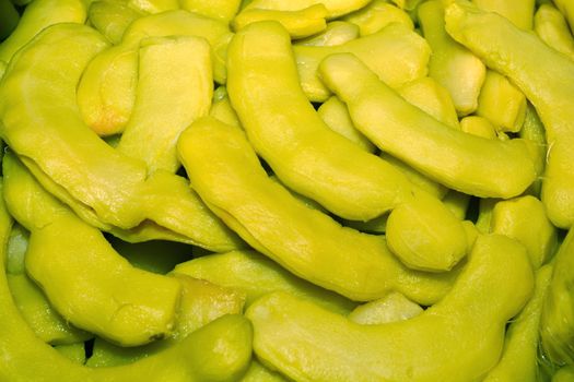 Heap of sweet pickled tamarind fruits for retail sale in Thailand food market. They are fruit preserves for long-term storage