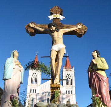 Jesus Christ on cross. Jesus christ statue in the churches