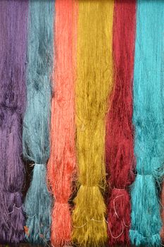 colorful of raw multicolor silk thread background
