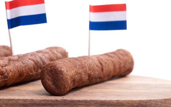 Wooden tray with frikadellen, a Dutch fast food snack, isolated