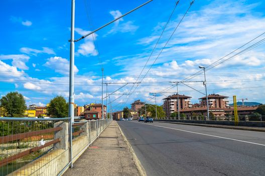 road on a bridge with houses in the background. Bologna, Italy