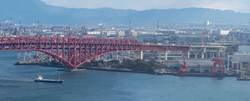 Panoramic aerial view of Osaka bay area with Minato bridge in Osaka, Japan