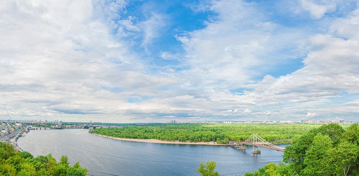 Panoramic view landscape on the Dnieper river, Trukhaniv island and park pedestrian bridge in Kiev, Ukraine