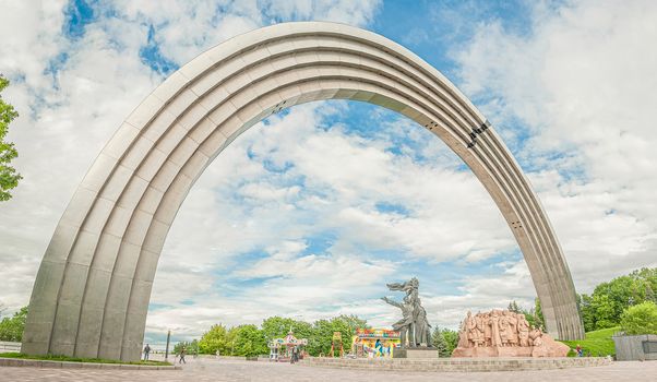 Peoples Friendship Arch with sculptural elements and statues is a monument in Kiev, Ukraine