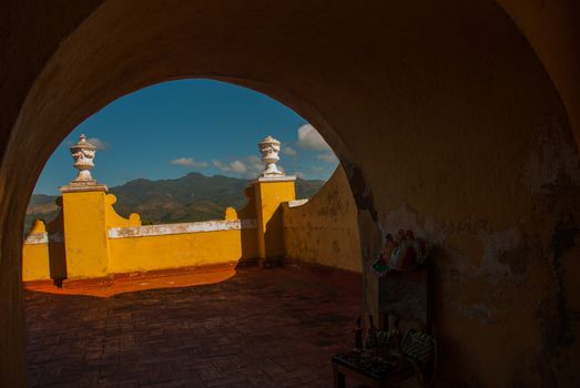 Top view of the mountains and the classic fence with vases. Trinidad on Cuba