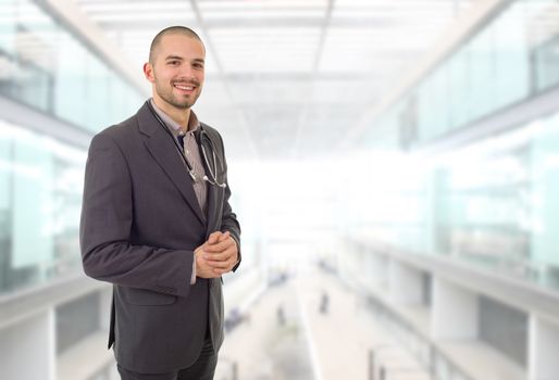 happy male doctor at the hospital