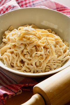 Fresh homemade italian tagliatelle pasta, also called fettuccine