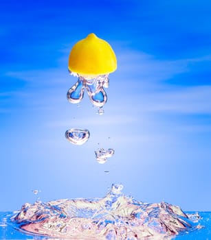 A lemon gushing out of the water