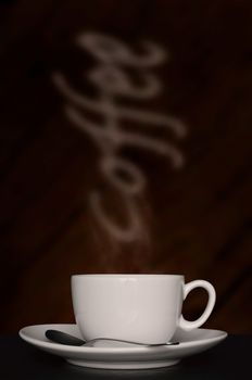 Time for a break. A cup of warm and flavored coffee with the smoke writing "coffee"