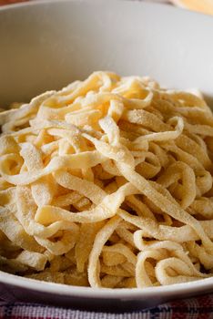 Fresh homemade italian tagliatelle pasta, also called fettuccine