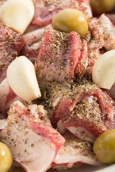 Marinade of lamb stew with herbes de Provence, garlic and olives