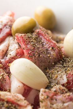 Marinade of lamb stew with herbes de Provence, garlic and olives