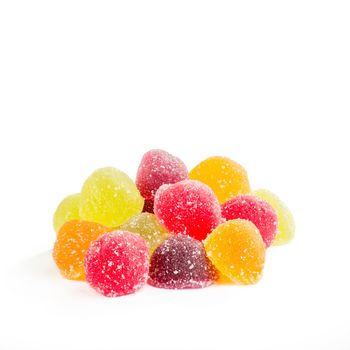 Colorful fruit jelly with sugar, on white background