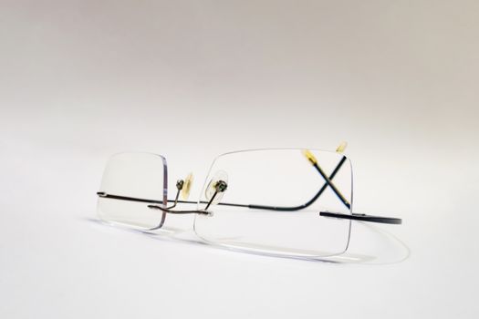 close up eyeglasses on white background