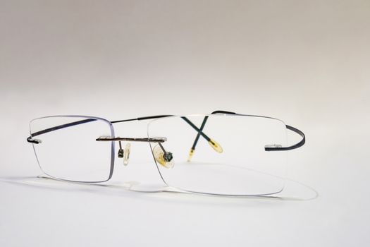 close up eyeglasses on white background