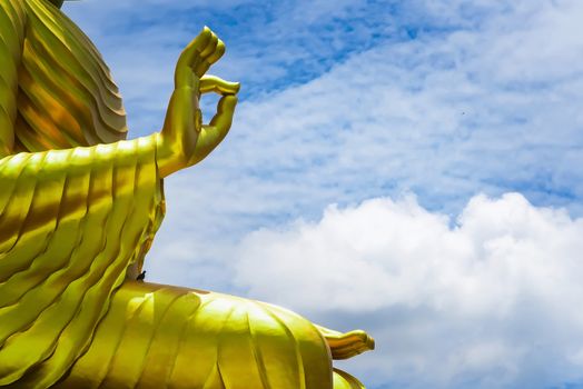 The hand of Big Goldden Buddha statue of Chareon Rat Bamrung Temple (Nong Phong Nok Temple) the place of faith in Thailand