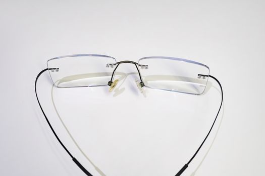 close up eyeglasses on white background