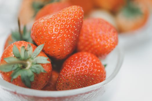 Strawberry is red fresh berry fruit color and sweet juicy for sale at Thai street food and fruit market in concept food and fruit, healthy eating in life