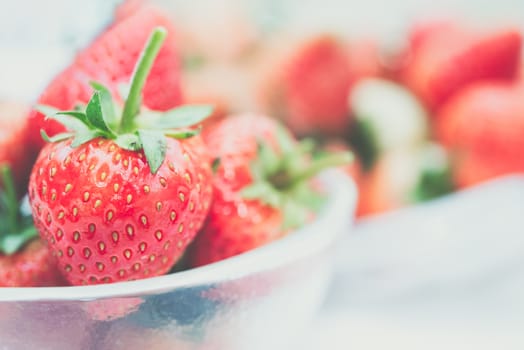 Strawberry is red fresh berry fruit color and sweet juicy for sale at Thai street food and fruit market in concept food and fruit, healthy eating in life