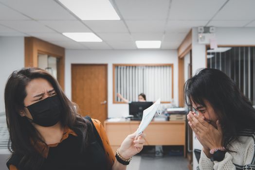 Asian pretty women wearing mask respiratory protection mask against epidemic flu covid19 or corona virus influenza in office with fear emotion in concept illness, outbreak, healthcare in life